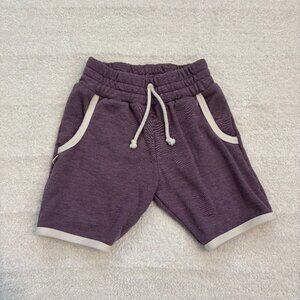 Childhoods purple shorts with white trim, 2 pockets, decorative tie at waist